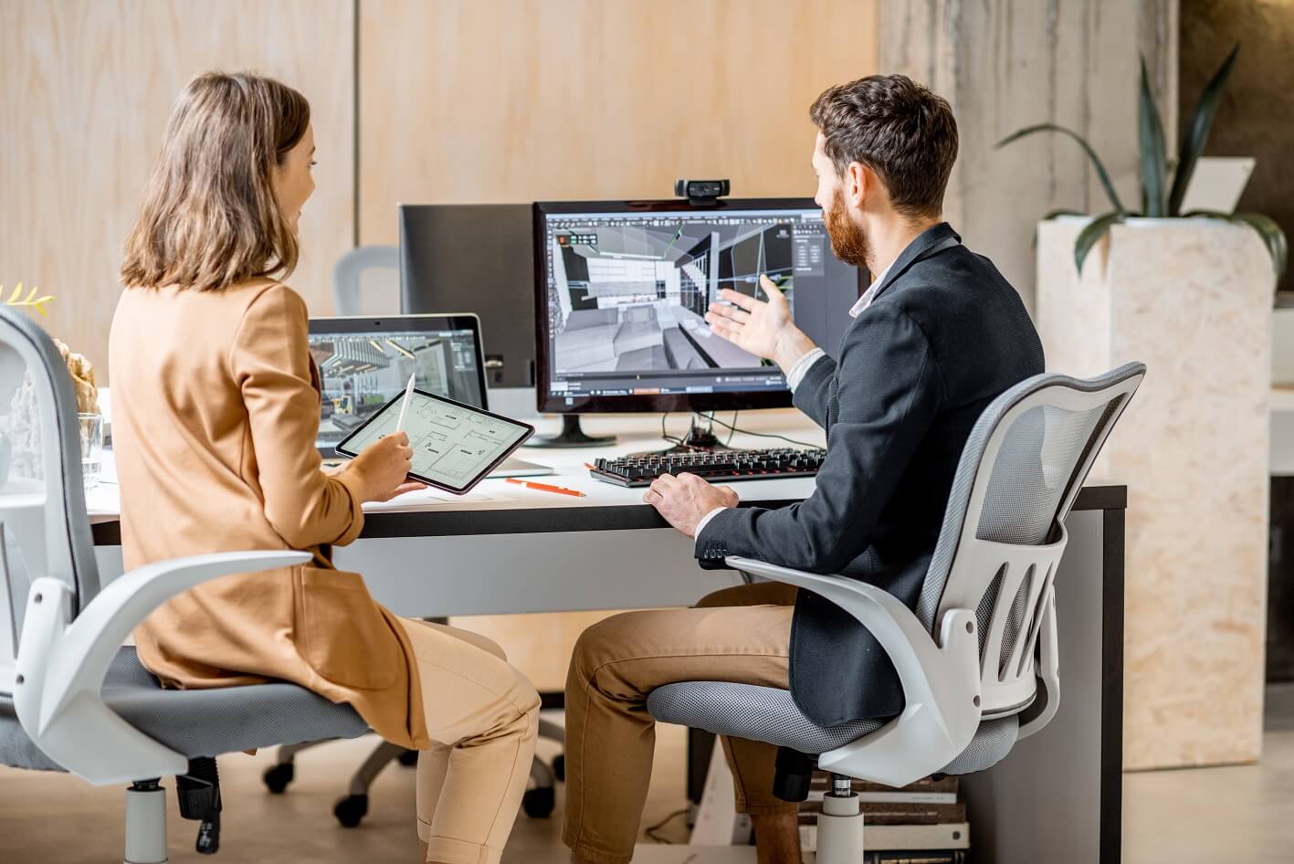 two-interior-designers-working-in-the-office-ZANFYNU